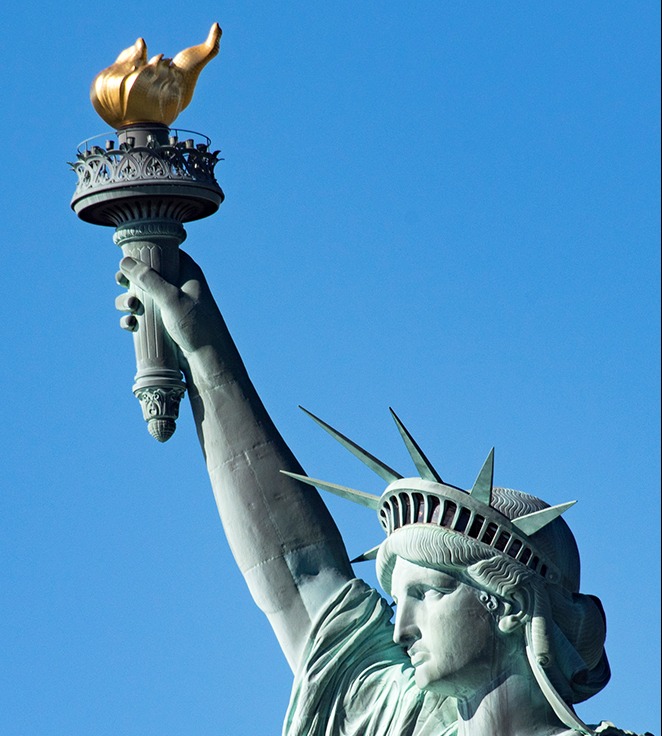 The head, right arm and torch of the Statue of Liberty. 