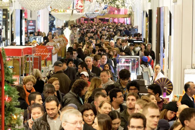 not for me Huge crowd packed together like sardines shopping at a mall at Christmas.