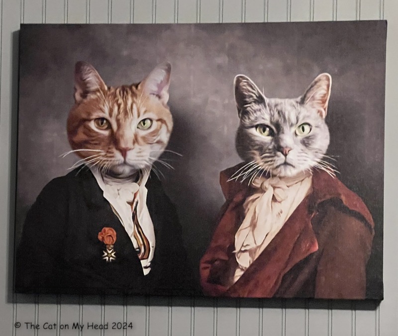 VICTORIAN GENTLEMeN CATS Portrait of an orange tabby cat and a grey tabby cat dressed as Victorian gentlemen.