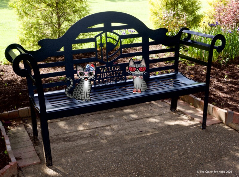Periwinkle Stinky The National D-Day Memorial in Bedford, Virginia Bench with two cartoon tabby cats at The National D-Day Memorial in Bedford, Virginia.